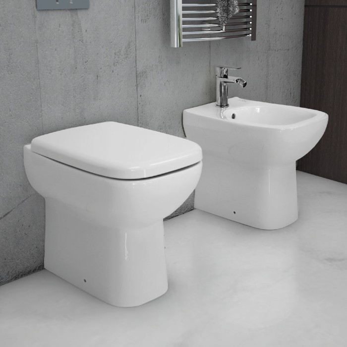Sanitari filomuro bianco lucido con sedile origin rak ceramics